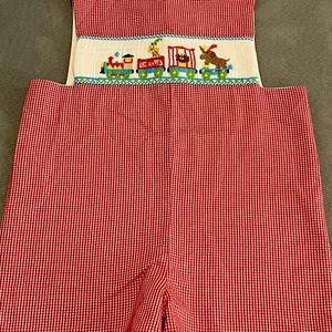 Sz 4T EUC smocked circus themed Jon Jon